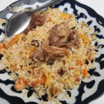 Plov Uzbeque: O que é e Como Fazer o Arroz com Carne